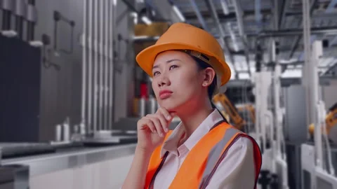 Female Engineer Thinking About Something, Battery Factory Stock Footage 314936685