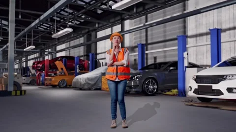 Female Engineer Thinking in Auto Repair Shop Stock Footage 313529636