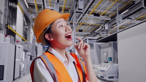 Female Engineer Thinking Then Raising Her Index Finger At Factory Digitalization Stock Footage 276929855