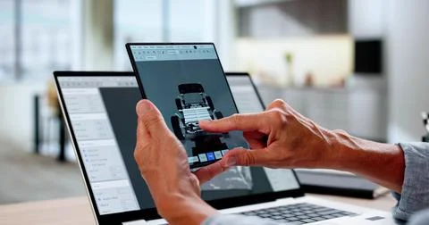 Female Engineer Using 3D CAD Software To Design EV Car Stock Photos