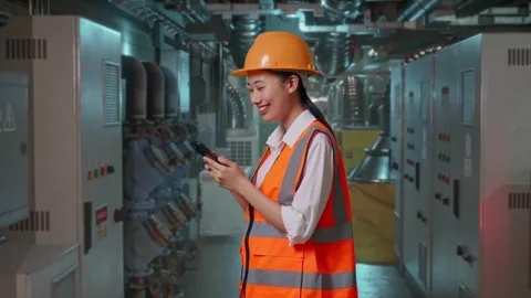 Female Engineer Using Smartphone In Engine Control Room Stock Footage 292368765