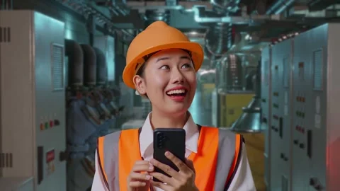 Female Engineer Using Smartphone In Engine Control Room Stock Footage 292369659