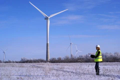 Female engineer with wind turbines Stock Photos