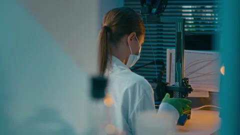 Female Engineer Working with 3D Printer in Scientific Laboratory Stock Footage 323352860