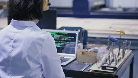 Female engineer working in cnc laboratory Stock Footage 111638823