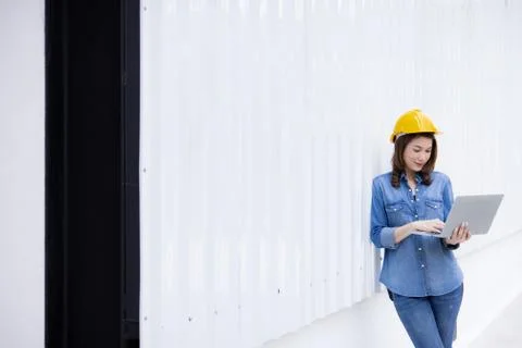 Female engineer working at construction site. Stock Photos