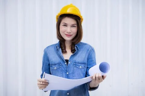 Female engineer working at construction site. Stock Photos