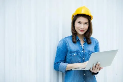 Female engineer working at construction site. Stock Photos