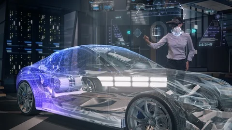Female Engineer working on Electric Car design using Futuristic AR Headset. Stock Footage