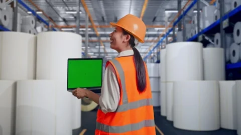 Female Engineer Working On A Green Screen Laptop at Polymer Plant Stock Footage 334531283
