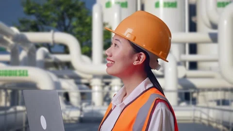 Female Engineer Working On A Laptop at Biodiesel plant Stock Footage 332116721