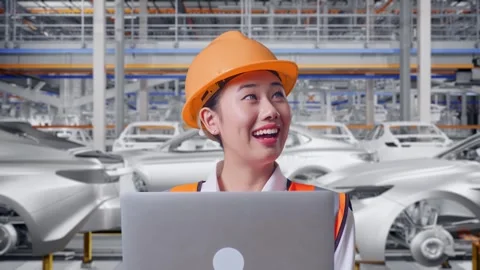 Female Engineer Working On A Laptop In Car Factory Stock Footage 331632568