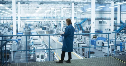 Female Engineer Working on Laptop at Electronics Factory Stock Footage 256033363