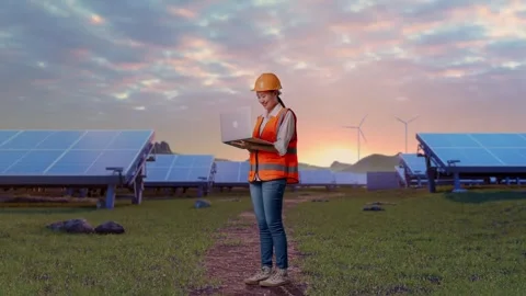 Female Engineer Working On A Laptop at Energy Farm Stock Footage 331028539