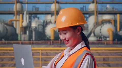 Female Engineer Working On A Laptop at Energy Plant Stock Footage 331140541