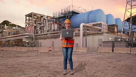 Female Engineer Working On A Laptop at Gas Plant Stock Footage 337764385