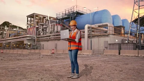 Female Engineer Working On A Laptop at Gas Plant Stock Footage 337764608