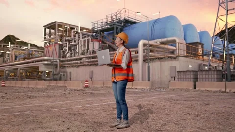 Female Engineer Working On A Laptop at Gas Plant Stock Footage 337764617