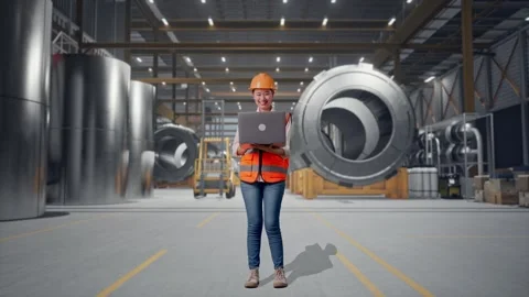 Female Engineer Working On A Laptop at Heavy Factory Stock Footage 340826129