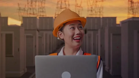 Female Engineer Working On A Laptop with High Voltage Power Stock Footage 331286119