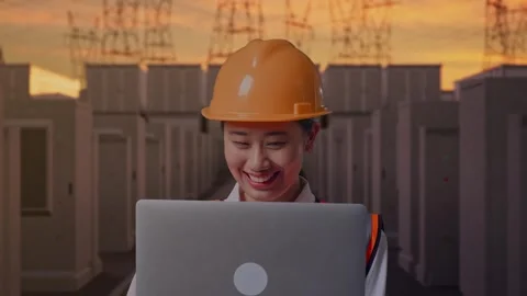 Female Engineer Working On A Laptop with High Voltage Power Stock Footage 331286131