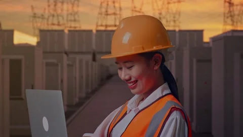 Female Engineer Working On A Laptop with High Voltage Power Stock Footage 331286298