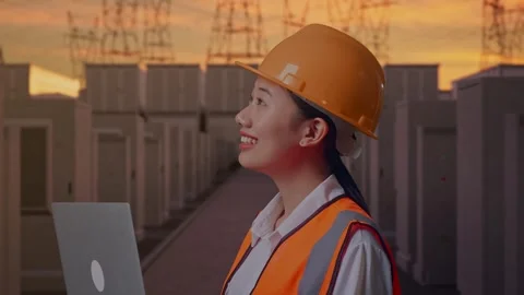 Female Engineer Working On A Laptop with High Voltage Power Stock Footage 331286306