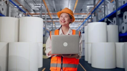 Female Engineer Working On A Laptop at Polymer Plant Stock Footage 334530512