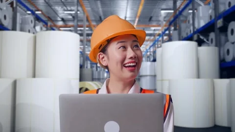 Female Engineer Working On A Laptop at Polymer Plant Stock Footage 334532216