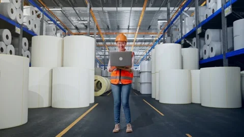 Female Engineer Working On A Laptop at Polymer Plant Stock Footage 334533476