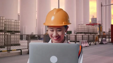 Female Engineer Working On A Laptop at Storage Facility Stock Footage 337754607