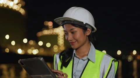 Female engineer working on tablet at construction site. Stock Footage 297787987