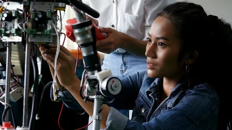 Female Engineering fixing machine in laboratory. Stock Footage 94070278