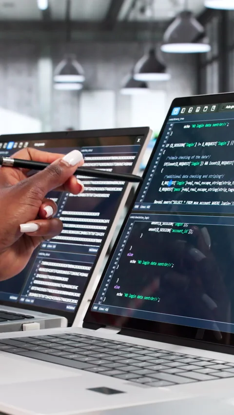 Female Engineers Reviewing Code On Laptop While Sitting Stock Footage 334531104