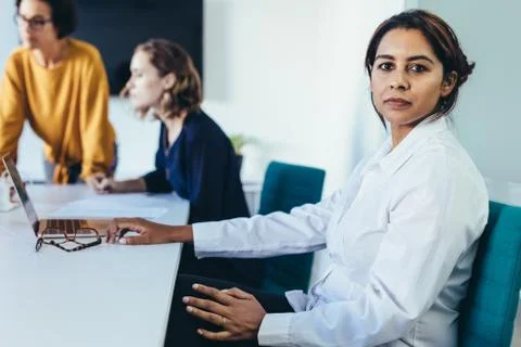 Female executive in conference room Stock Photos