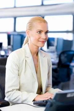 Female executive using computer Foto stock