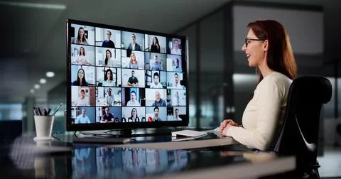 Female Executive Using Virtual Webinar For Online Business Interview Solution Stock Photos