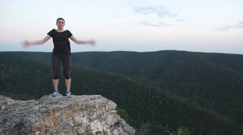 Female exercisers on the top of the mountain Stock Footage 68596480