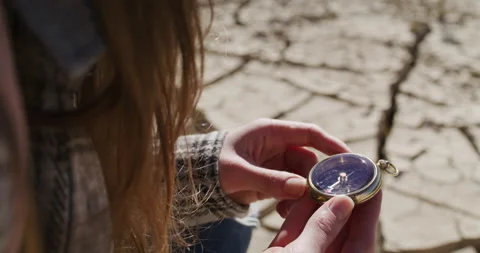 Female Explorer Holds Up Compass Light Flair Stock Footage 238553862