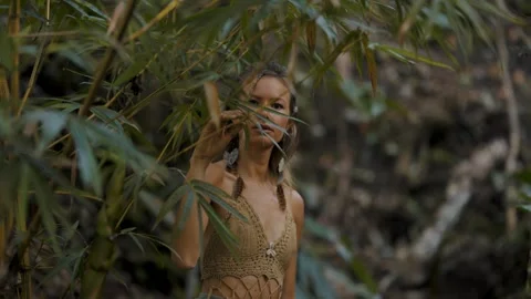 Female explorer surrounded by dense jungle vegetation in Peten, Guatemala. Stock Footage 336477193
