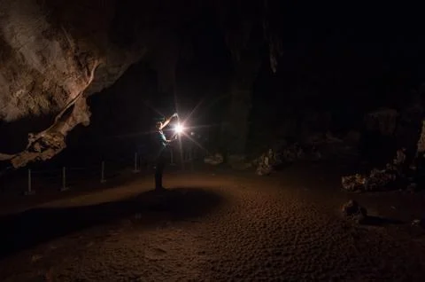 Female explorers in cave. Stock Photos
