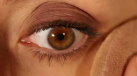 Female eye expression closeup - face powder application Stock Footage 11392753