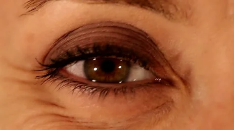 Female eye expression closeup - looking around and smiling Stock Footage 11393287