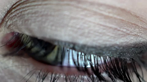 Female eye with makeup captured close-up Stock Footage 144023919