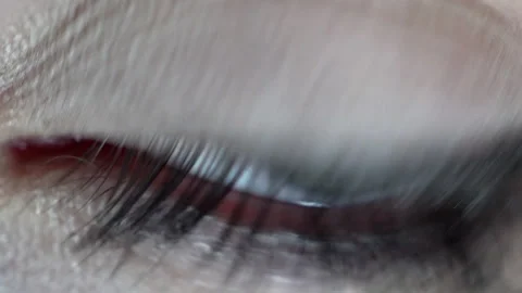 Female eye with makeup captured close-up Stock Footage 144024077