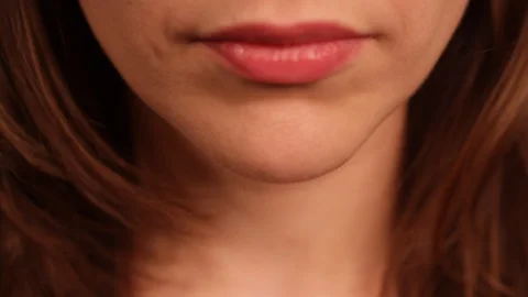 Female Face closeup tilt up Stock Footage 129779885