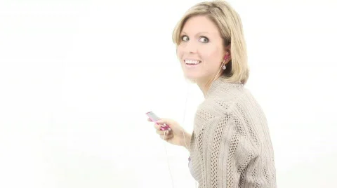 Female Face girl with mp3 player or cell - 6 - talking about me again? Stock Footage