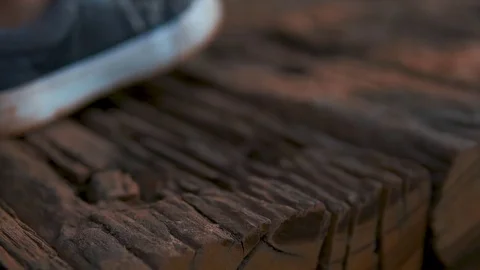 Female feet walking wooden ground Stock Footage