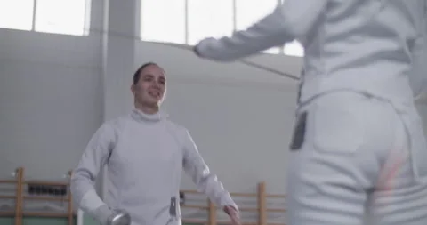 Female fencers warming up before workout Stock Footage 224963324