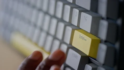 Female Finger Pressing Enter Key on Computer Keyboard Stock Footage 317975982